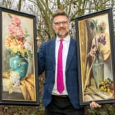 Charles Hanson, owner of Hansons Auctioners, with Queen Victoria’s paintings.  