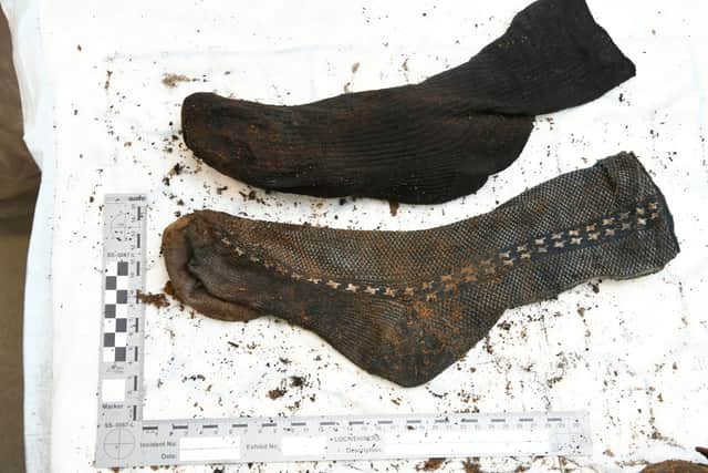 Items of clothing found with the human remains.  