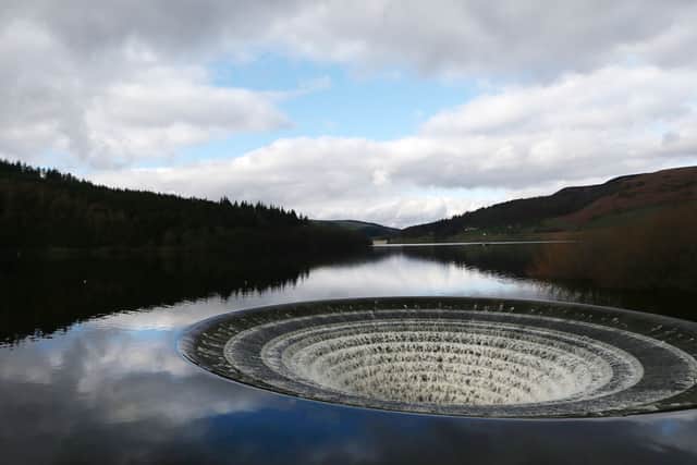 Water flowing down the 'plughole' on the Ladybower Reservoir, in February 2014.
