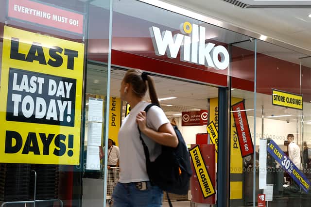 A shopper walks past a Wilko store in Putney on September 12, 2023 in London.