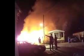 Bodycam footage shows heroic police response to a large caravan fire in Cranbourne.