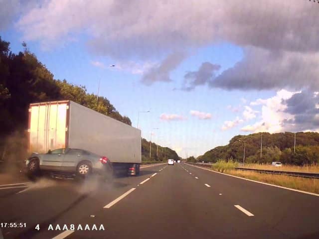 Speeding driver smashes into back of lorry before flipping over.