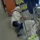 CCTV shows the moment a shopper staged a fake accident in a supermarket to try and claim thousands of pounds in injury compensation from Iceland. 