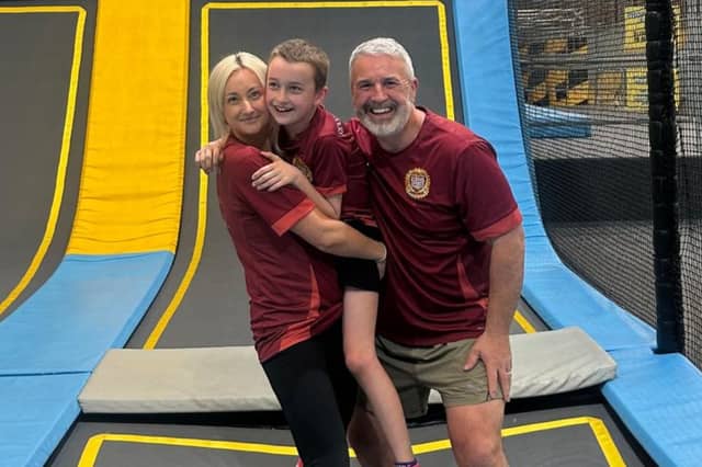 Zak with mum Helen and dad Gavin Bailey, who are funding a new £30,000 SEND support programme following their family's own experience.