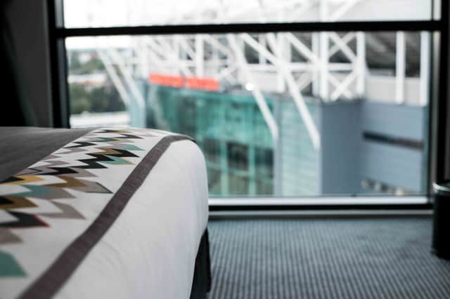 One of the Class of ’92 rooms at Hotel Football in Manchester, with football-inspired touches throughout.
