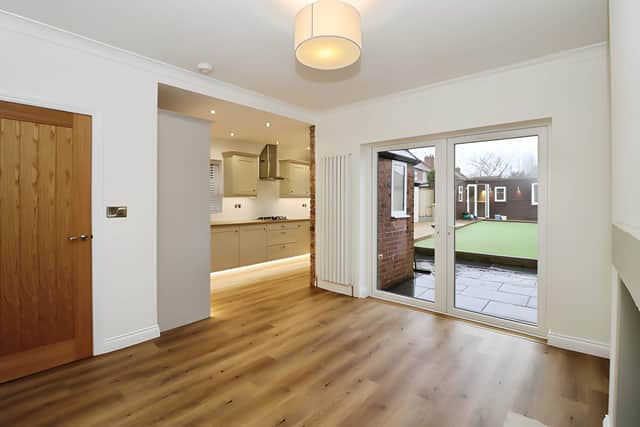 Lounge or main reception room: A spacious lounge combines neutral decor with a characterful log burner for a warm and inviting main reception space