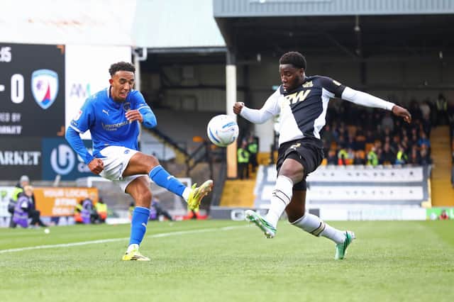 Remeao Hutton gets a cross in on a frustrating afternoon at Port Vale