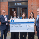 Celebrating the success of their recent Wills Month campaign are (from left) Rob Woodhead executive director at BRM, paralegals Grace Blant, Emily Passey, corporate fundraiser at Blythe House Hospice, solicitor Jess Bradfield and executive director Paul Berresford.