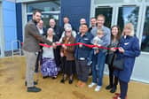  Headteacher Arron Tasker  with Staveley councillor Elaine Tidd and members of the Falconer family and local church members at the official opening ceremony of the new  Falconer building.