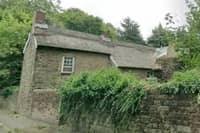 Applications for planning permission and listed building consent to replace the thatched roof with grey slate tiles on Coldwell Cottage, Southgate, Eckington have not yet been determined by North East Derbyshire District Council. 