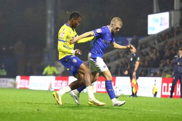 Ryan Stirk shields the ball in the draw with Colchester United