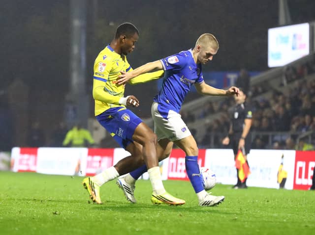 Ryan Stirk shields the ball in the draw with Colchester United