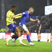 Ryan Stirk shields the ball in the draw with Colchester United
