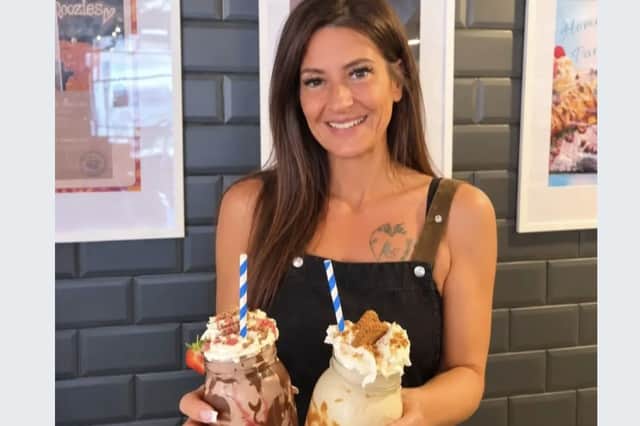 Elisa Cooper is at the helm of Qoozies