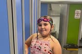 Delilah Carline-Nickson, nine, is set to swim 100 pool lengths to help her sister.