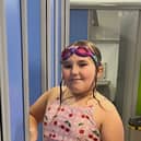 Delilah Carline-Nickson, nine, is set to swim 100 pool lengths to help her sister.