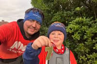 Seven-year-old Oscar Wilson of Ilkeston with his dad Nikki.