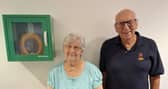 Margaret Bowen, with Tony Carter, Dicky Tickers chairman and the defibrillator