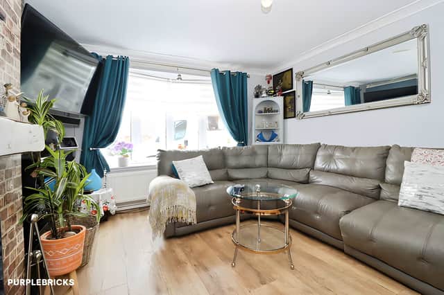 The bungalow's practical layout provides a welcoming entrance into the main living accommodation