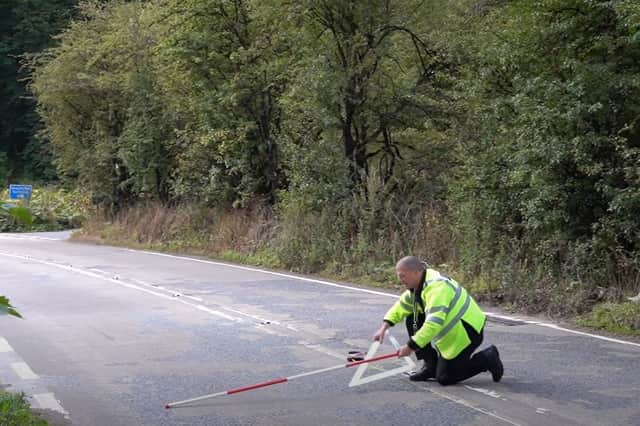 The markings encourage riders to travel through the gaps between them, helping them choose an appropriate speed and road position