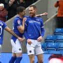 Tom Naylor celebrates his goal for Chesterfield against Crewe