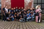 Tracey Ann  Smith,  kneeling left on front row, with the hair stylists who responded to her call to support the makeover event for the charity DEBRA.