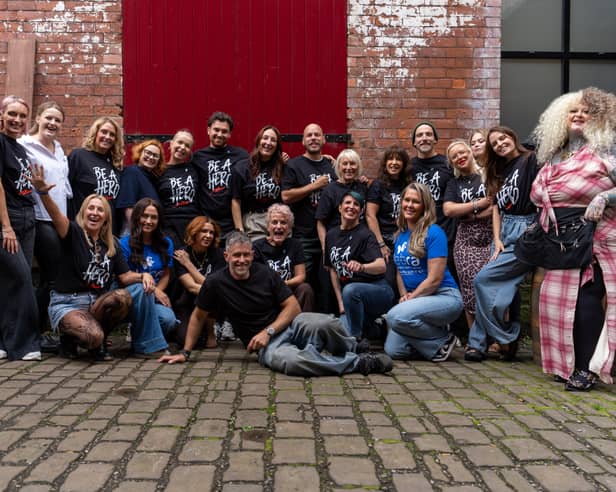Tracey Ann  Smith,  kneeling left on front row, with the hair stylists who responded to her call to support the makeover event for the charity DEBRA.