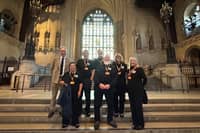 Members of Belper's Cancer Pitstop with Jonathan Davies, MP for Mid Derbyshire, in the chapel inside the Palace of Westminster.