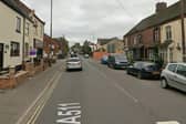 The A511 High Street in Woodville is closed.