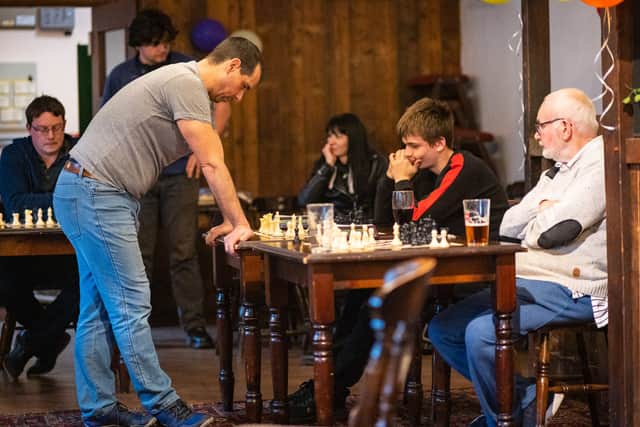Top player John Potter conducts a simul exhibition match at Belper Chess Club