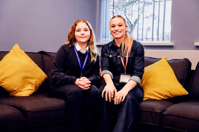 Jodie Ounsley with a pupil in the longe in the new residential block