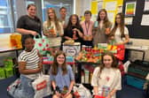 Eight students from Murray Park School in Mickleover have spent the day packing food hampers for families in need across the school community