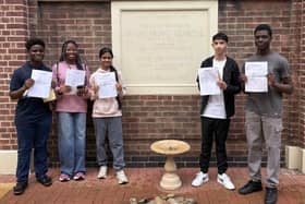 From left to right: David, Prayer, Resandi, Pavol and Praise collecting their GCSE results at The Bemrose School.