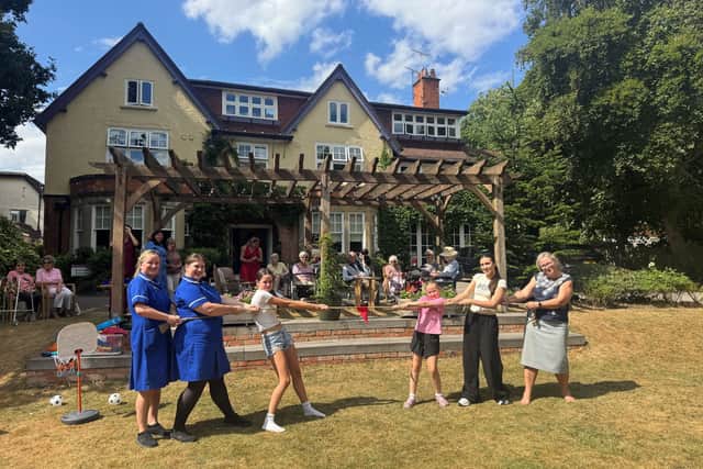 Staff, families and residents at Brookfields Private Nursing Home having fun at their sports day