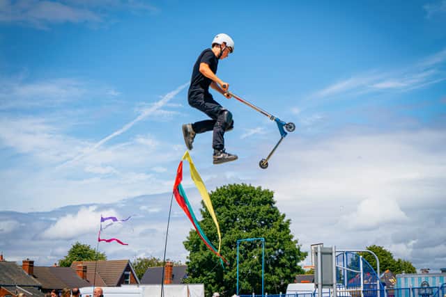 A daredevil glides through the air during an Extreme Wheels Roadshow event held at Bolsover's Hornscroft Park