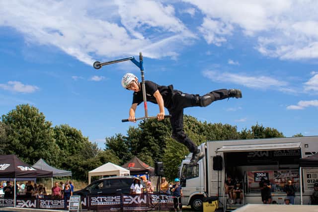 TJ Huckle entertains crowds with his scooter skills