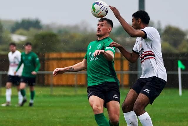 Action from Sleaford against Shirebrook.