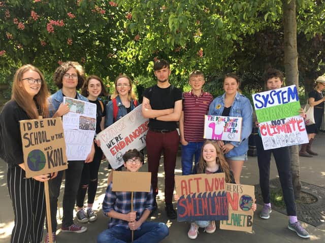 Young environmentalists campaigning to save the planet.