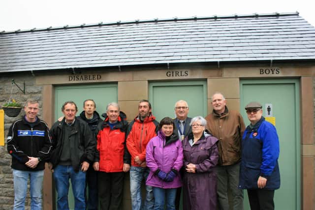 Councillors from Youlgrave Parish Council and residents at the opening of the new toilets.