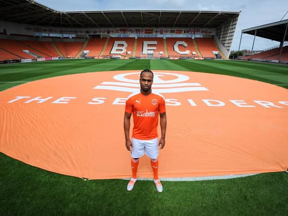 Nathan Delfouneso unveils Blackpool's new kit