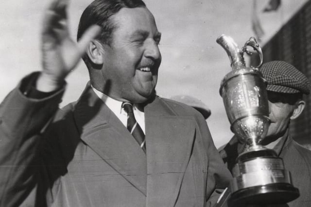 Bobby Locke of South Africa with the Open trophy after winning it for the third time in four years in 1952