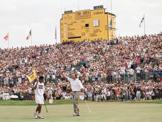 Tom Lehman of the United States and his caddy Andy Martinez celebrate after winning the 125th Open Championship on 21st July 1996. Photo: Getty Images