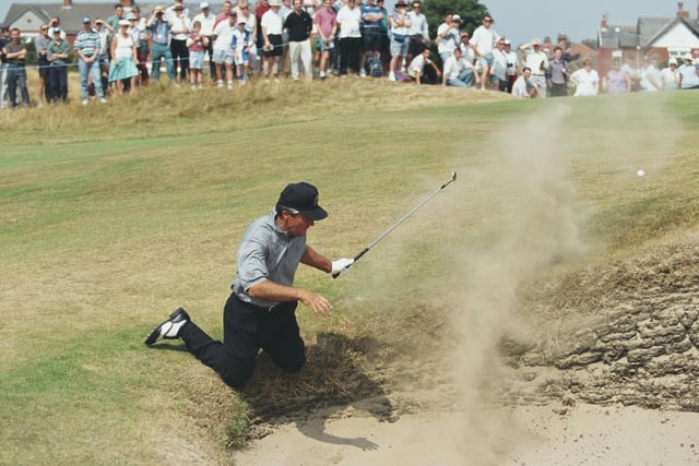 Gary Player of South Africa hits his ball out of the bunker as spectators look on during the Senior Open Championshipon 23 July 1994 at Royal Lytham. (Photo by Phil Inglis/Allsport/Getty Images)