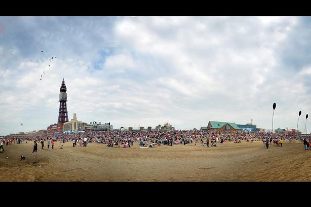 The RAF Falcon display team descend on a packed beach in 2013