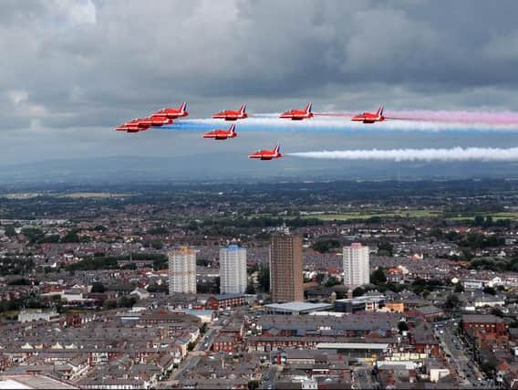 The Red Arrows head over the Layton flats in Blackpool during the airshow in 2013