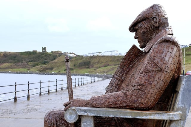 Visit the Freddie Gilroy statue and bench in Marine Drive