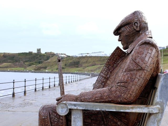 Visit the Freddie Gilroy statue and bench in Marine Drive