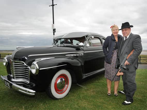 Kevin Swift and Deanna Holland with their 1941 Buick Eight