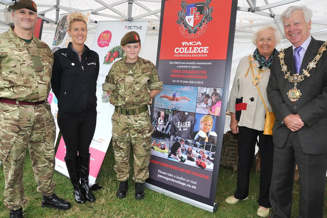 The Mayor and Mayoress of Fylde Kevin and Val Eastham visit the YMCA College stand, with L-R Kingsman Corey Hopwood, Lisa Birtwistle from Fylde Coast YMCA, and Private Chantelle Mellor