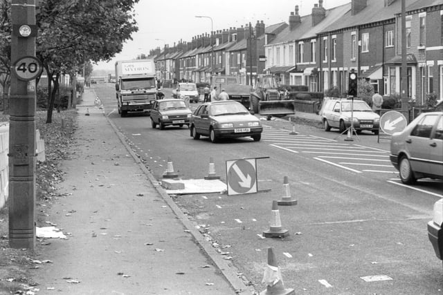 Traffic being held up on Castleford Road, Normanton, near to Woolworth's store, as traffic calming features are added to the road